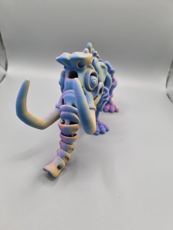 Colourful 3D-printed mythical creature with large tusks