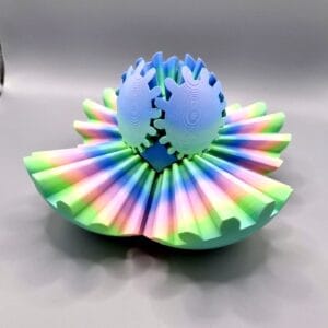 Pastel rainbow 3D-printed interlocking gear sculpture